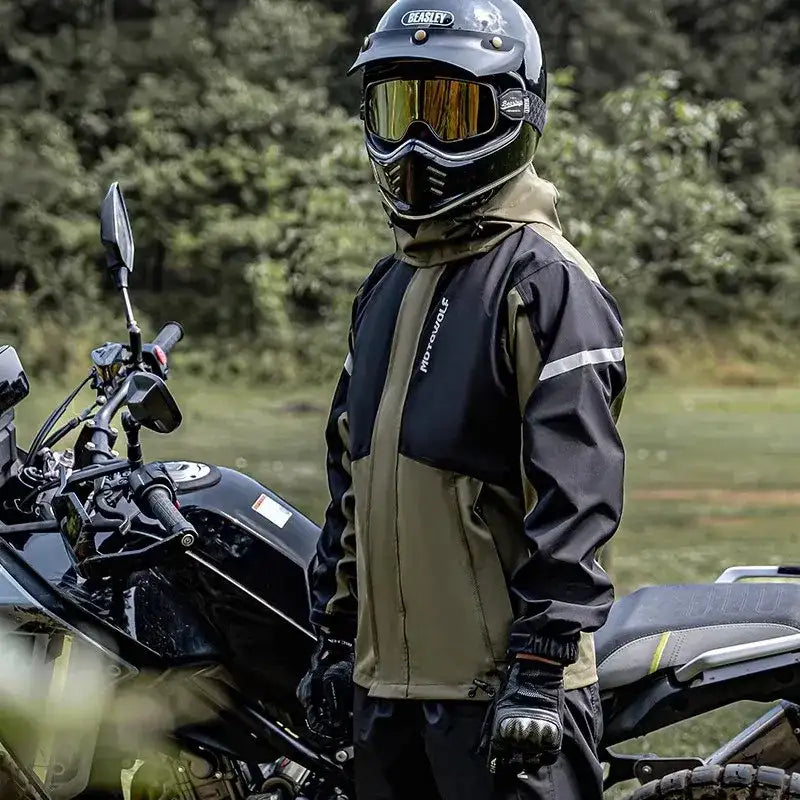 Black and olive green motorcycle jacket with reflective white stripes, featuring a ’motorola’ logo on the chest.